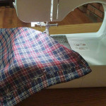 Step 3: Fold your fabric in half like a hot dog made from haggis and sew a 1” hem along the raw side edge. As well as a 1 ½ hem on the ends. Step 3: Fold your fabric in half like a hot dog made from haggis and sew a 1” hem along the raw side edge. As well as a 1 ½ hem on the ends.